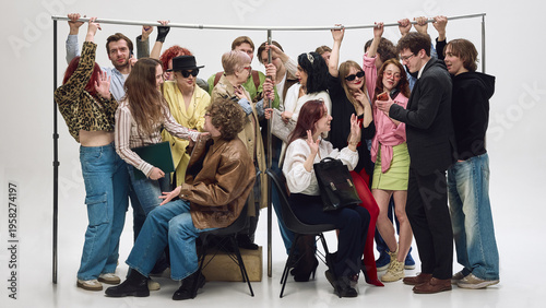 Diverse group of people standing very close holding rail in tight subway setup. Concept of crowd density, space management, transport demand, urban mobility challenges.