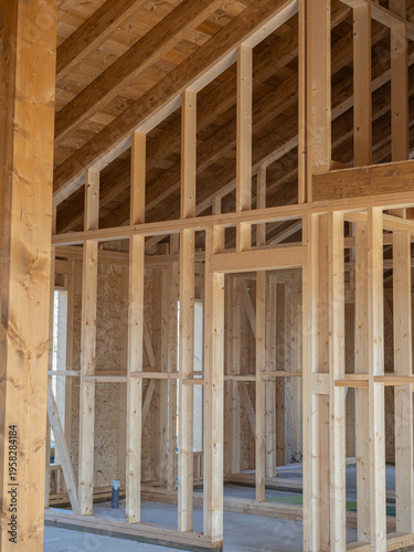 Interior detail of a wooden house under construction using the light frame system