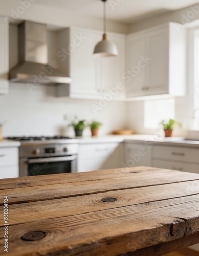 Wooden table top with blurred modern kitchen interior background, empty rustic surface for product display, home cooking space with white cabinets and natural light
