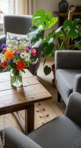Cozy Living Room With Fresh Flowers And Lush Greenery Bringing Nature Indoors