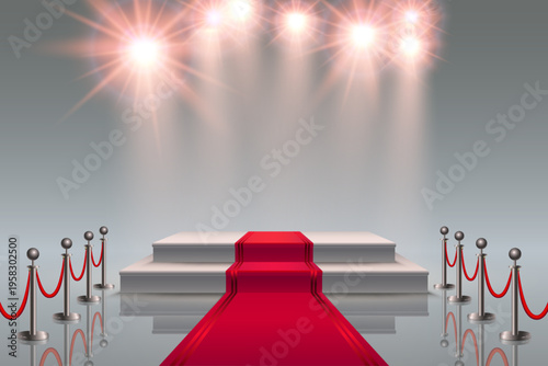 Red carpet walkway leading to podium with spotlights