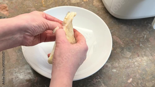 cleaning boiled cod fish