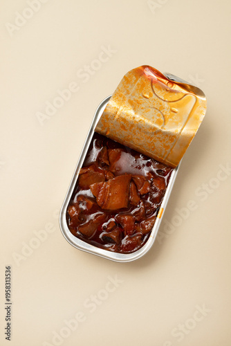 can of octopus with sauce