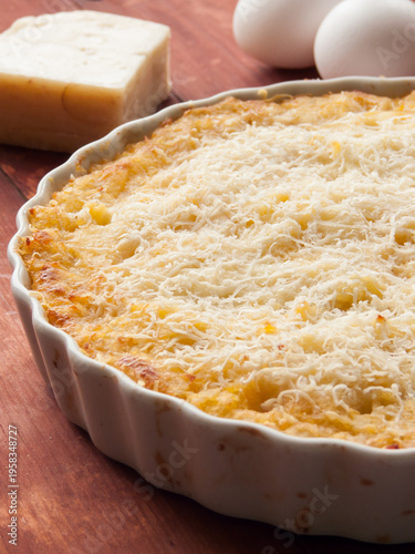 Homemade Shepherd's Pie crispy mashed potato and minced meat, covered with parmesan cheese.