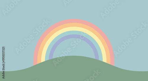 Soft Pastel Rainbow Arching Over Green Hill.