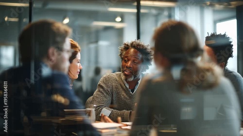 A lively discussion unfolds in a bright office space, where colleagues share ideas and collaborate on exciting projects, fostering creativity and teamwork.