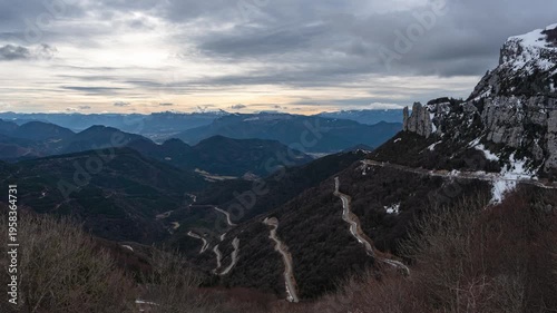 Col du Rousset mountain road timelapse, winding alpine road with moving clouds in Vercors massif, France