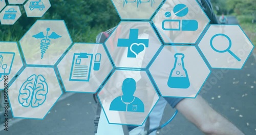 Animation of medical icons over caucasian couple cycling