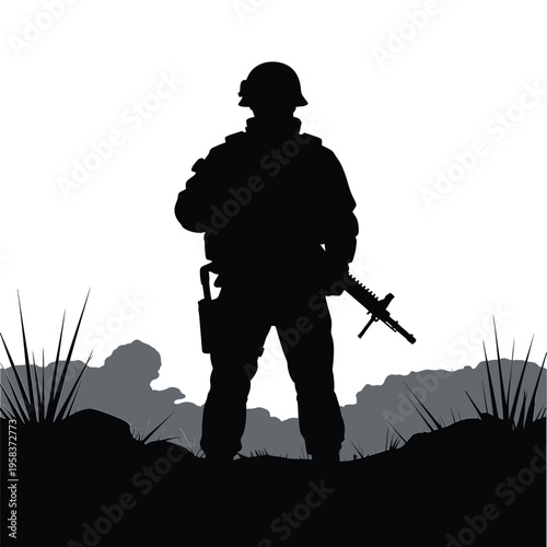 Silhouette of a soldier standing guard against a mountainous backdrop