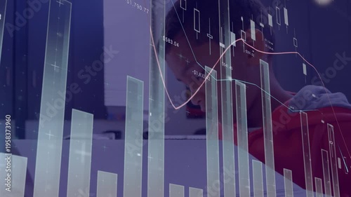 A blind schoolboy is sitting at desk 4k, side view, reading a braille book in class