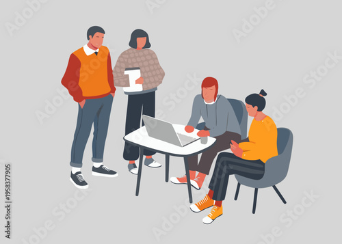 A group of young professionals collaborating around a laptop in an office