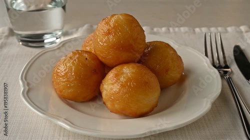 Golden Puff Puff Nigerian Doughnuts on White Plate
