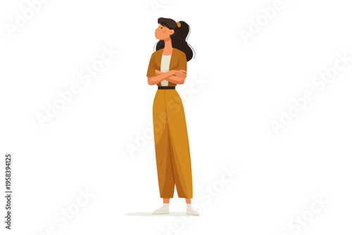 Young caucasian female in stylish outfit standing confidently with arms crossed