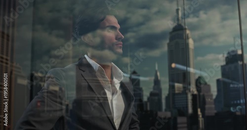 White Businessman in a Gray Suit Stands in a High-rise Office, Focused on Startup Planning and Financial Growth, Projecting Ambition, Entrepreneurial Confidence and a Subtle Successful Smile.