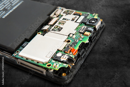 Smartphone repair process involves disassembling the device to access internal components for inspection and fix