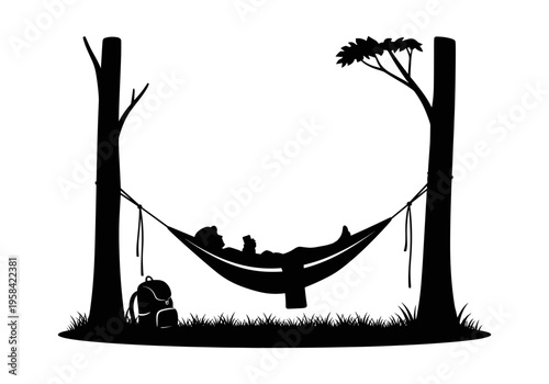 Silhouette of person relaxing in hammock between trees with backpack nearby