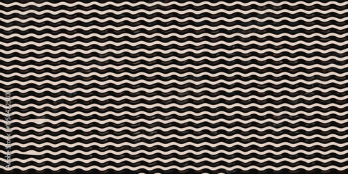 Close up of a woven rug with a repeating chevron pattern