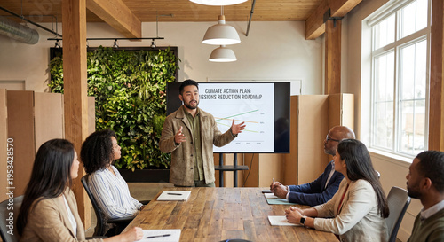 Business Meeting on Climate Action Plan in Modern Conference Room