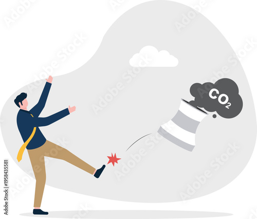 Businessman kicking away a factory chimney representing green business practices