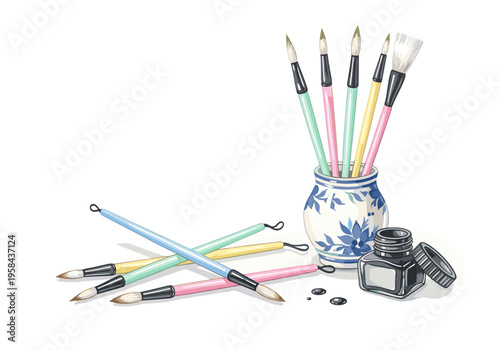 Artistic tools including brushes and inkwell arranged for creative expression