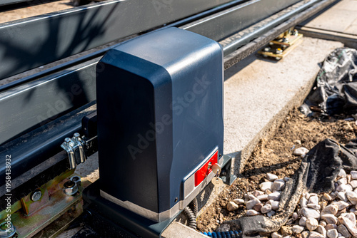 Automatic sliding gate motor drive installation