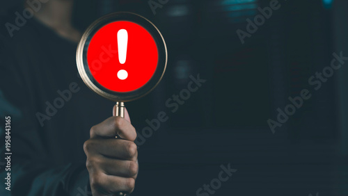 Warning alert and risk management with magnifying glass and exclamation mark icon. Danger detection, problem identification, cybersecurity threat, error notification and business risk analysis.
