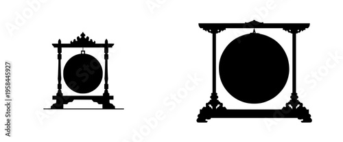 Timeless Echoes: A Majestic Bronze Gong on a Decorative Wooden Stand