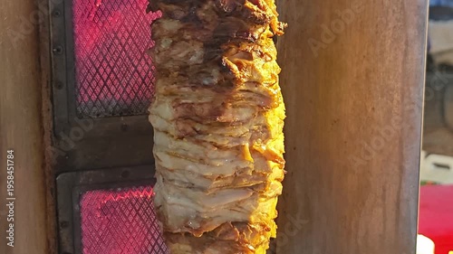 Kebab on steel bars in the market.