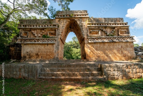 Obraz na plátne Ancient stone archway stands beneath a bright sky