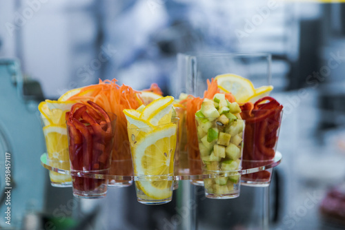 fresh fruit and vegetable slices in cups