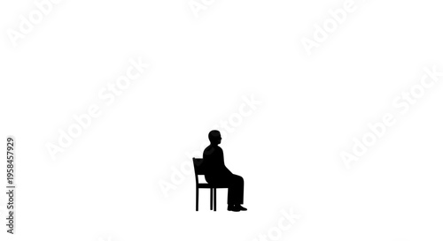 Silhouette of a person sitting on a chair in a calm and relaxed state of mind