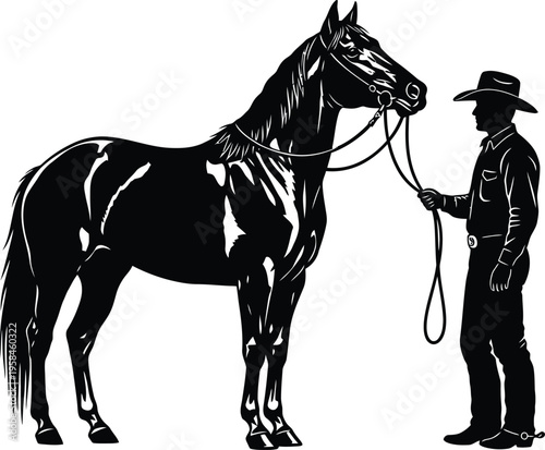A cowboy standing next to a horse holding its reins in a classic western scene