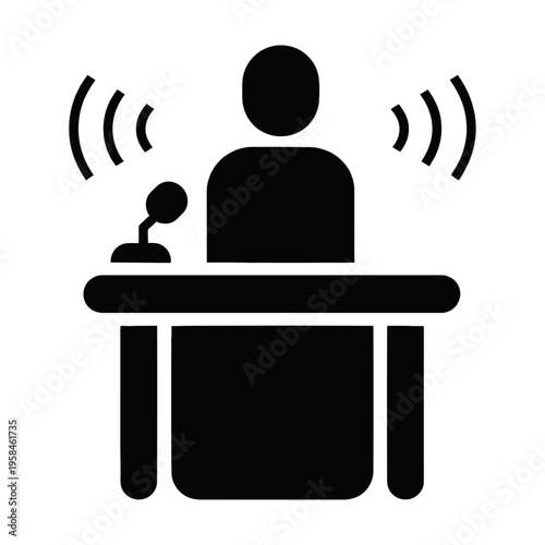 Person sitting at a table with a microphone in a vector silhouette illustration