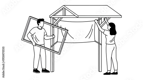 Artistic Collaboration: Two individuals work together, arranging the elements to a display, focusing on teamwork. 