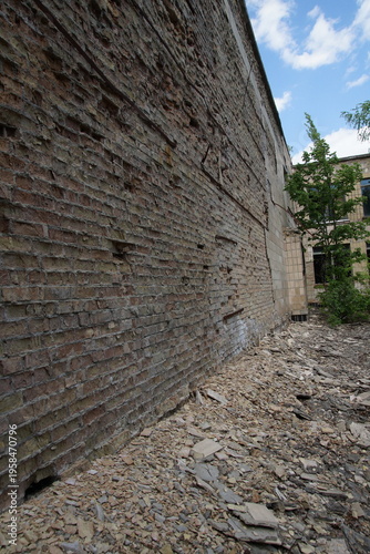 Canvas Print Detailed View of a Crumbling Brick Wall of an Abandoned Building in Pripyat