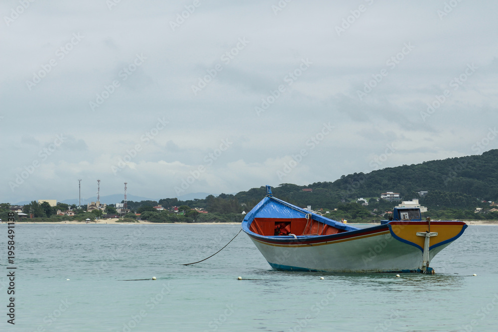 Naklejka premium boat on the beach