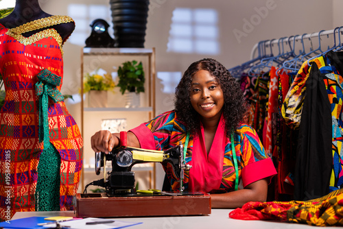 Foto African female tailor creating unique garments in her workspace