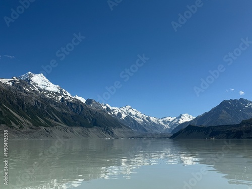 Tasman Glacier terminal lake with floating icebergs and turquoise water, Mount Cook, New Zealand