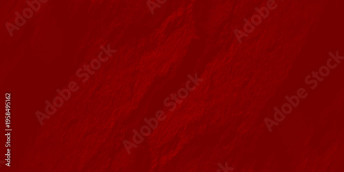 Deep red textured wall background with organic rough plaster surface and soft shadows