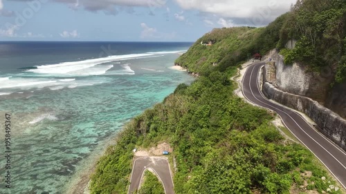 Aerial Drone View of Coastal Highway Road Next to Turquoise Ocean
