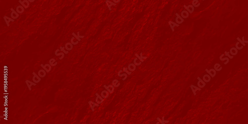 Deep red textured wall background with organic rough plaster surface and soft shadows