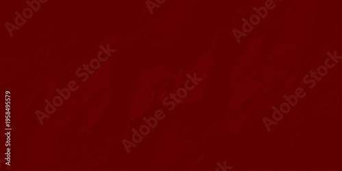 Deep red textured wall background with organic rough plaster surface and soft shadows