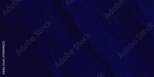 Deep navy blue abstract fabric texture background with elegant crinkled silk folds and dramatic shadows for luxury design
