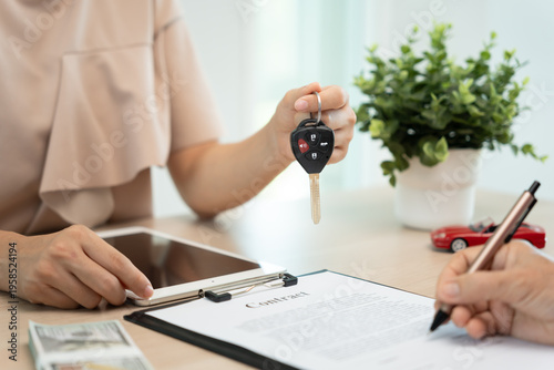 lease, rental car, sell, buy. Dealership manager send car keys to the new owner. Sales, loan credit financial, rent vehicle, insurance,  renting, Seller, dealer, installment, car care business