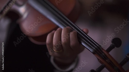 Close up of Musician Playing Violin in Professional Suit