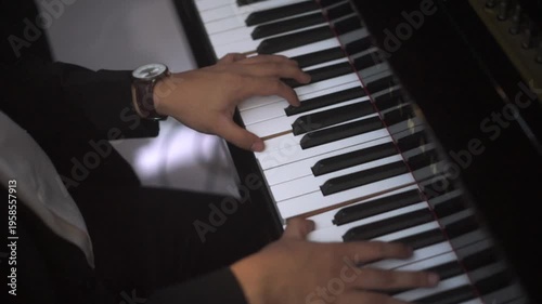 Close up of Musician's Hands in Suit Playing Grand Piano Keys