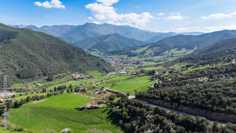 Fototapeta premium Aerial drone view of San Miguel in Potes Cantabria Spain hermitage and viewpoint near Santo Toribio with Picos de Europa on a sunny day