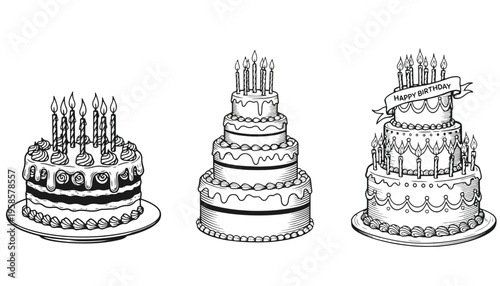 Three tiered birthday cakes with lit candles are displayed on white plates.
