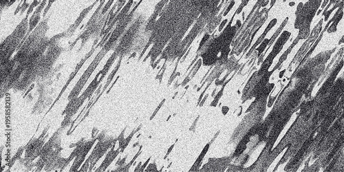 Abstract monochrome texture with diagonal streaks and granular noise creating a dynamic and textured background for design applications