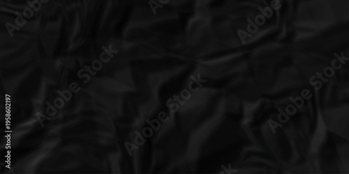 Crumple crushed black paper obsolete rumple craft design. wrinkle ripped creased crumple aged closeup recycled document grunge paper background.